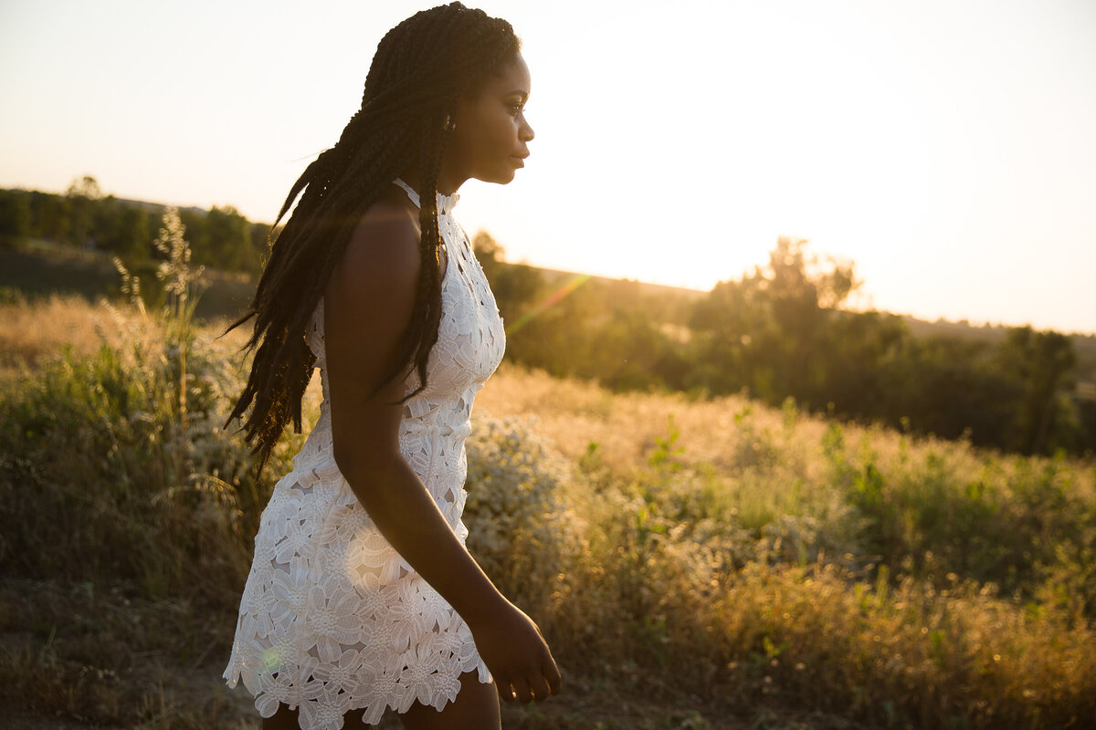portrait-senior-highschool-sunset-fresno-field-walking