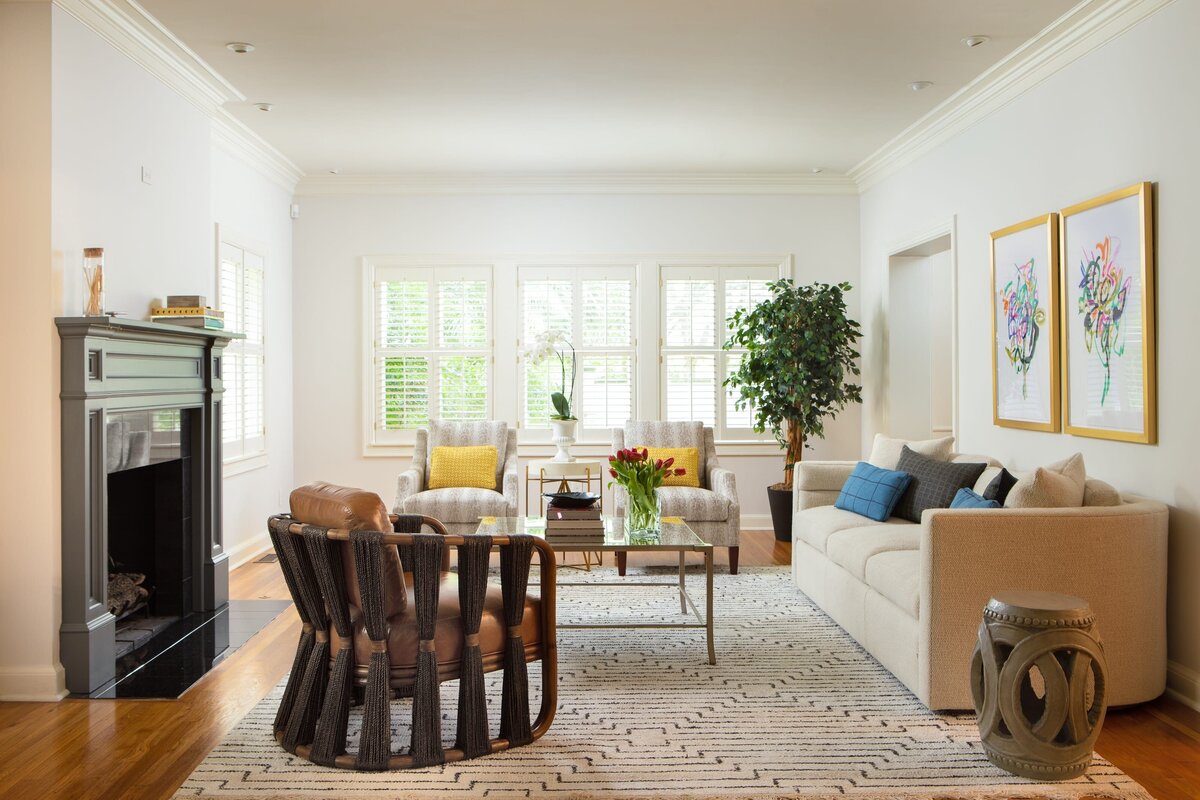 the keeping room interiors alta living room with tree in corner and large accent chair