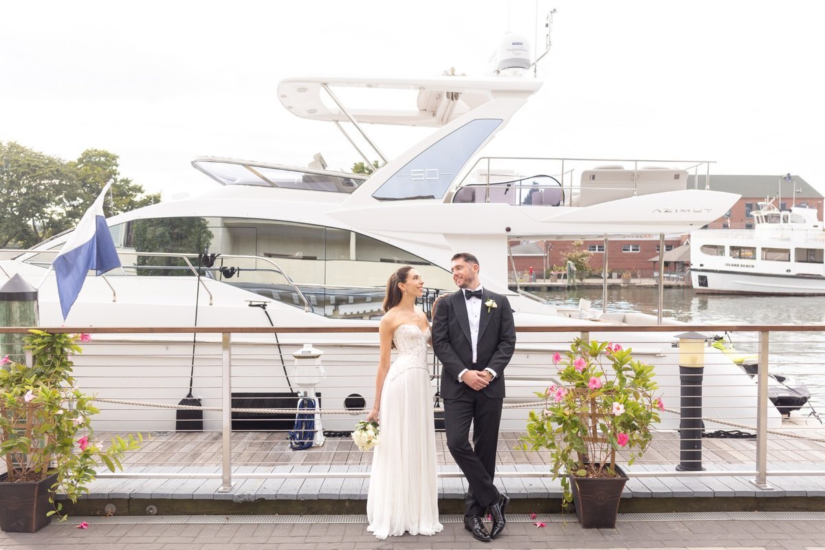 Capture the romance of a Bonnet Island Estate wedding with a stunning dockside portrait. Elegant, timeless wedding photography by a top New Jersey wedding photographer.