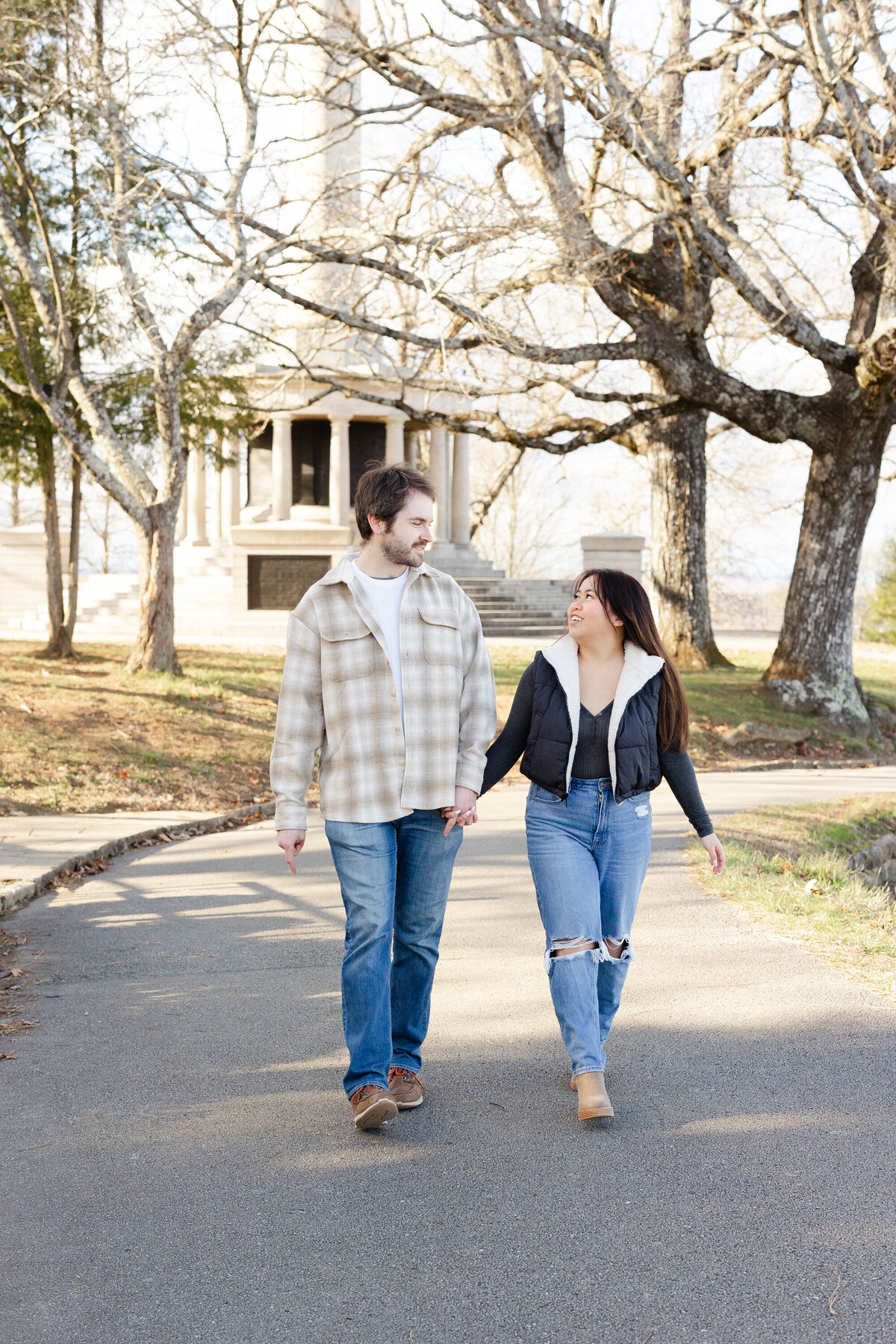 engaged couple walking together at Point Park in Chattanooga