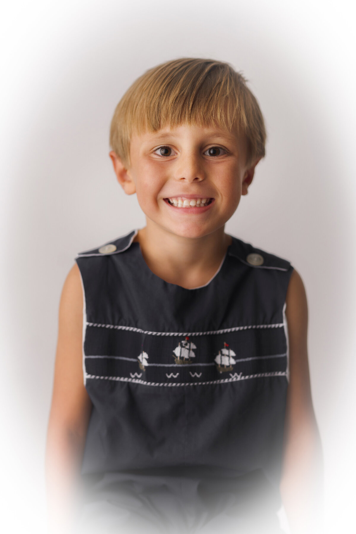 Young boy poses for Heirloom Photos in Charleston, South Carolina.