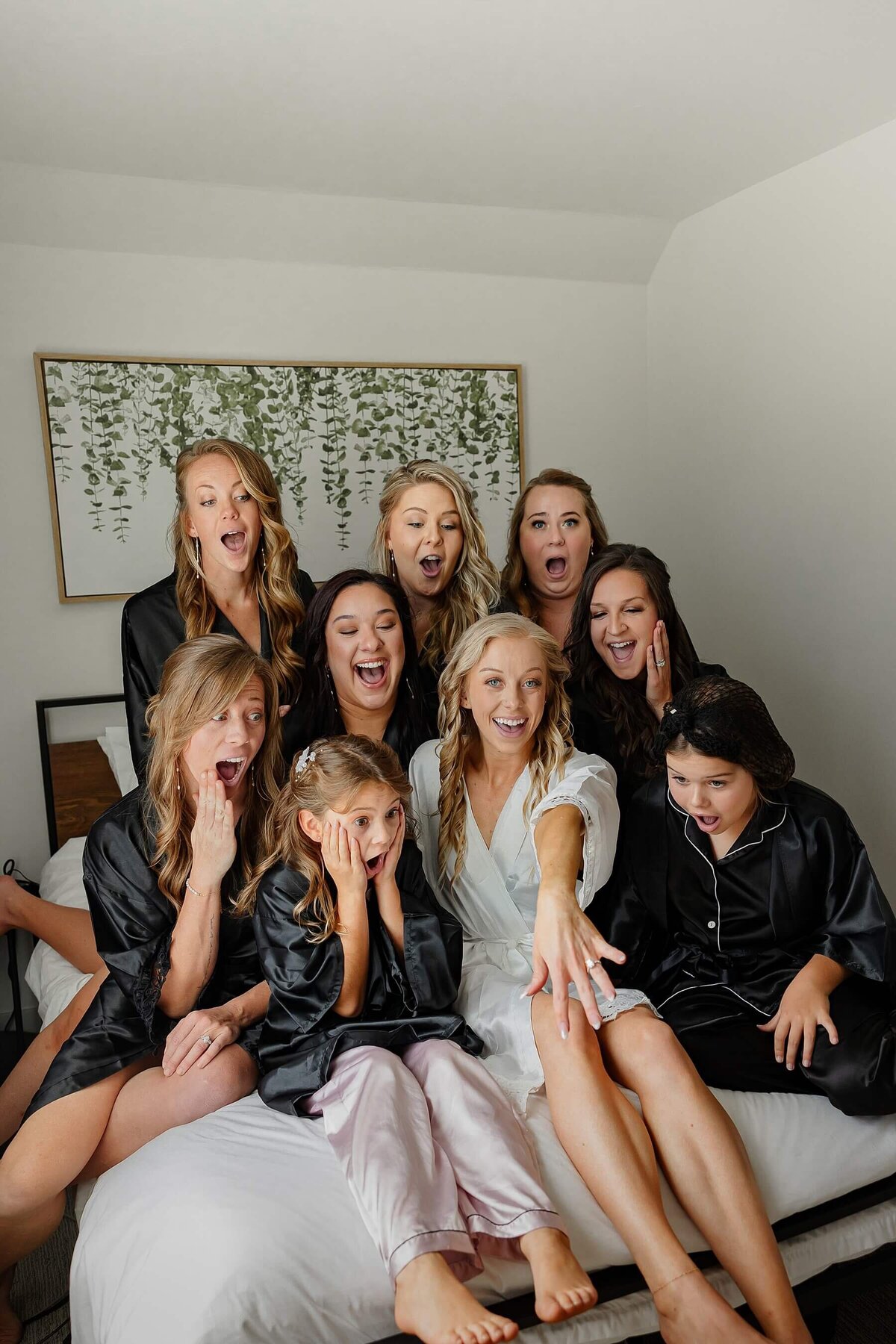 bridal getting ready group photograph with brides ring. Photographed by Michelle Colorado Wedding Photographer