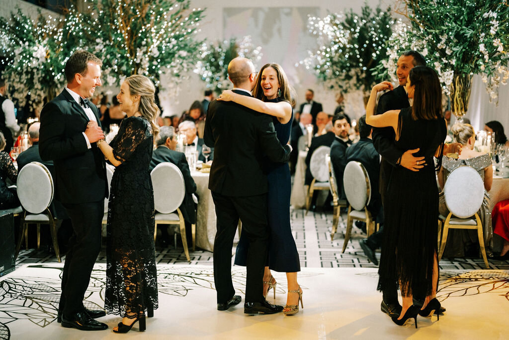 Wedding guest dancing at the reception. 
