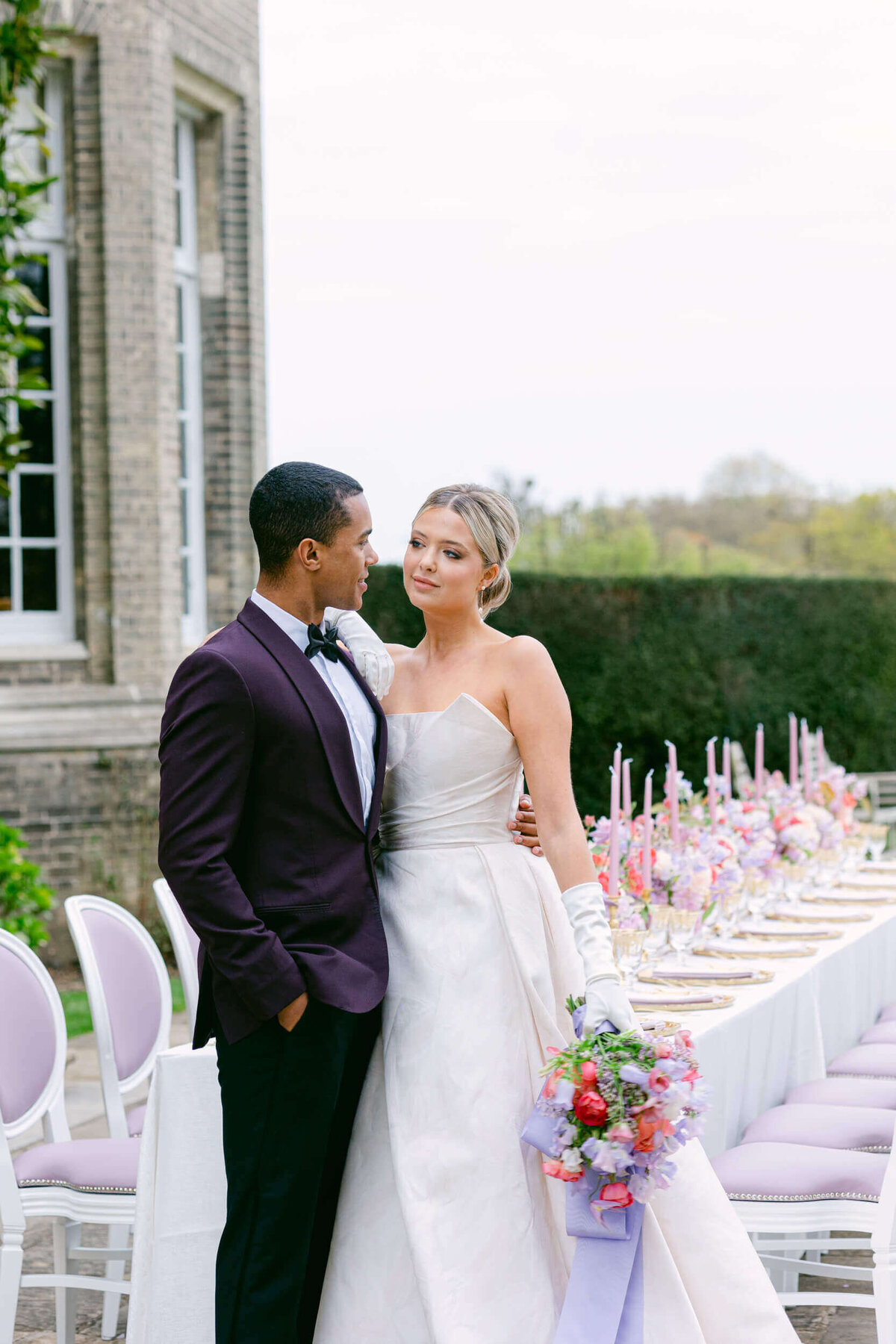 A wedding day photo of the bride and groom at Hedsor House in the Uk