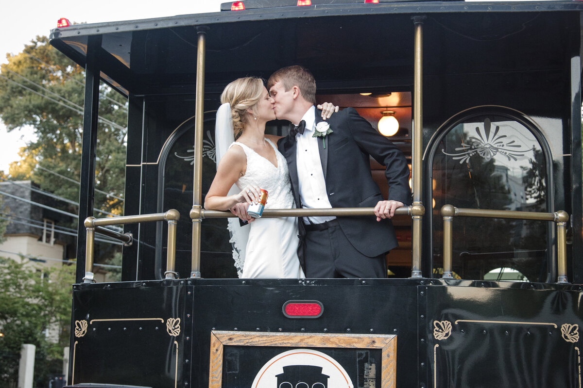 bride and groom on trolley
