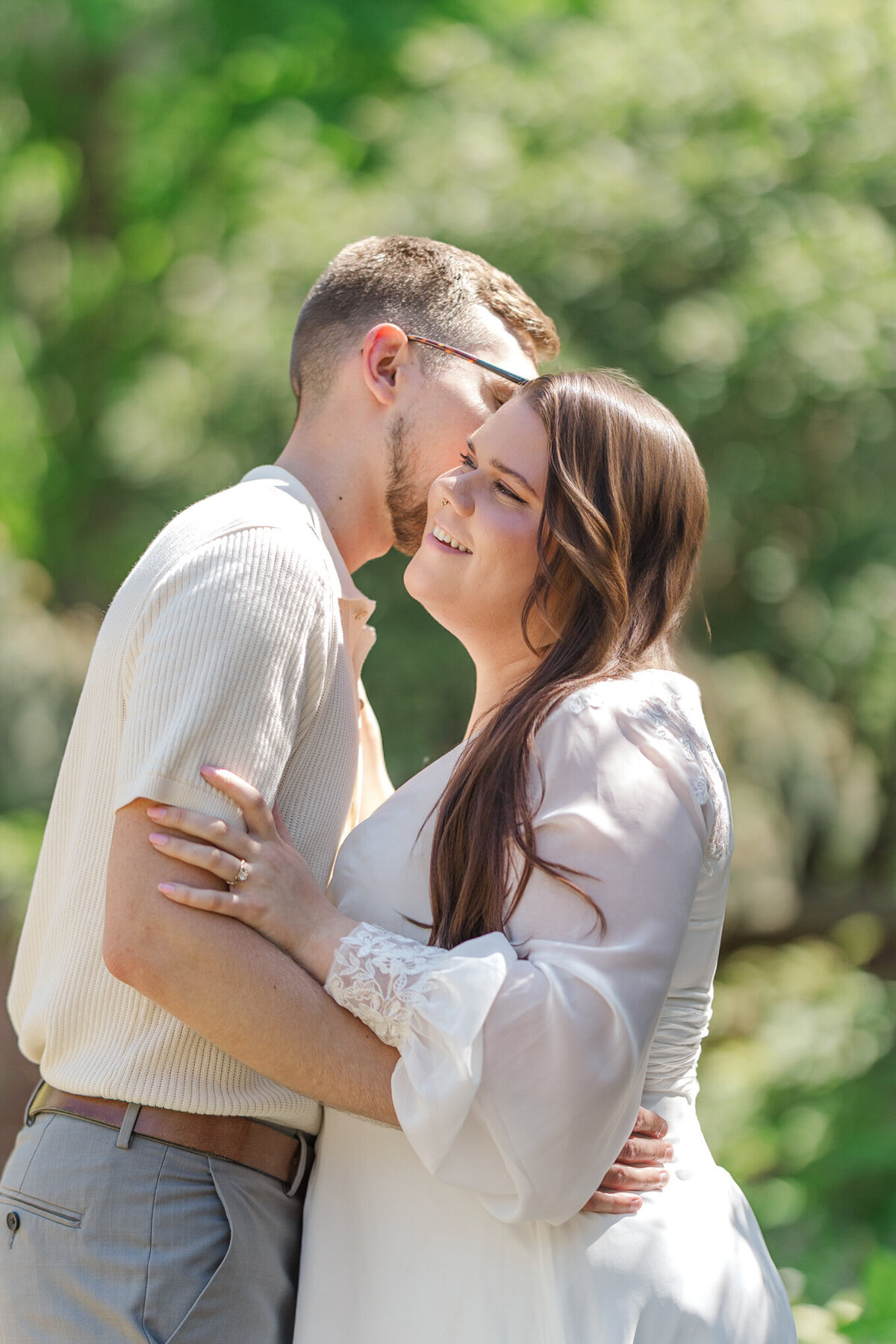 Intimate engagement photography with natural, bright colors by Claire Katan.