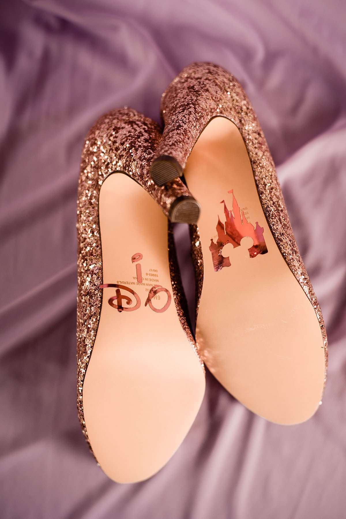 Rose Gold wedding shoes with Disney Castle and I Do on the bottoms