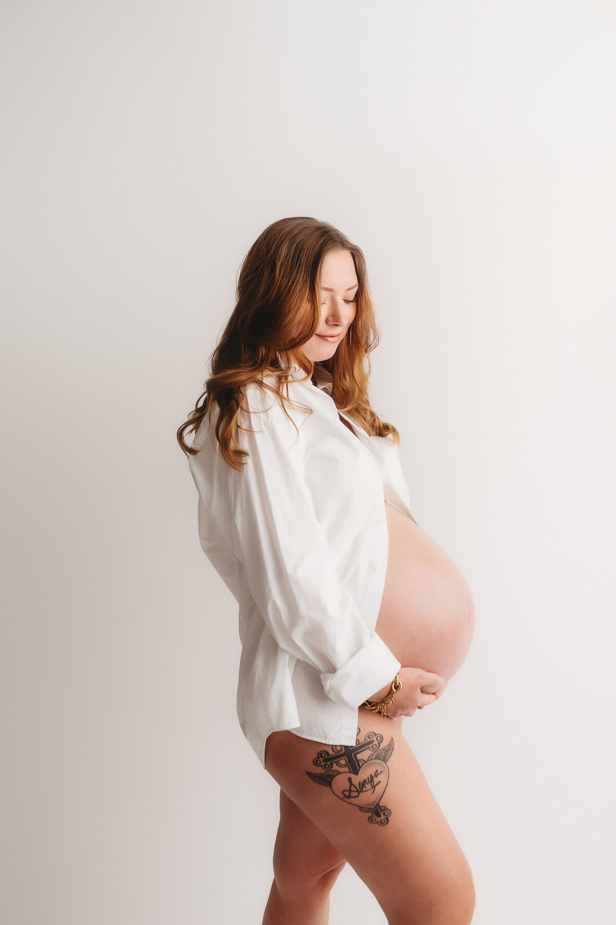 Pregnant mother poses for Maternity Portraits in Charleston, SC. 