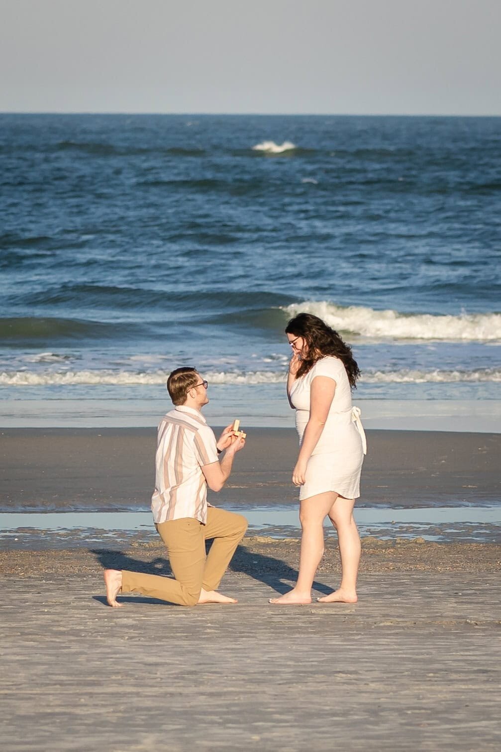 Surprise proposal on the beach