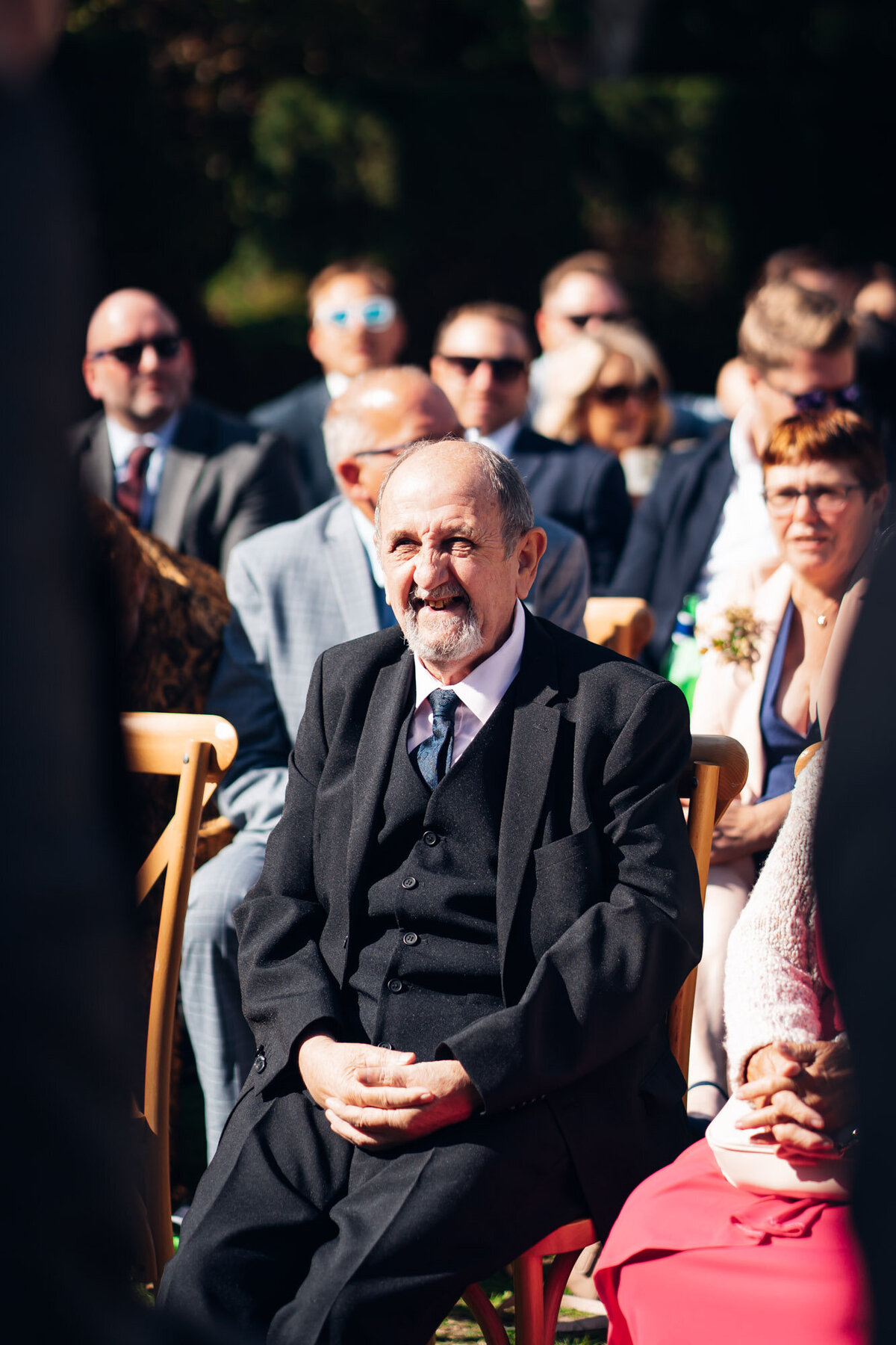 Pauntley-court-wedding-photographer-guests-during-outdoor-ceremony