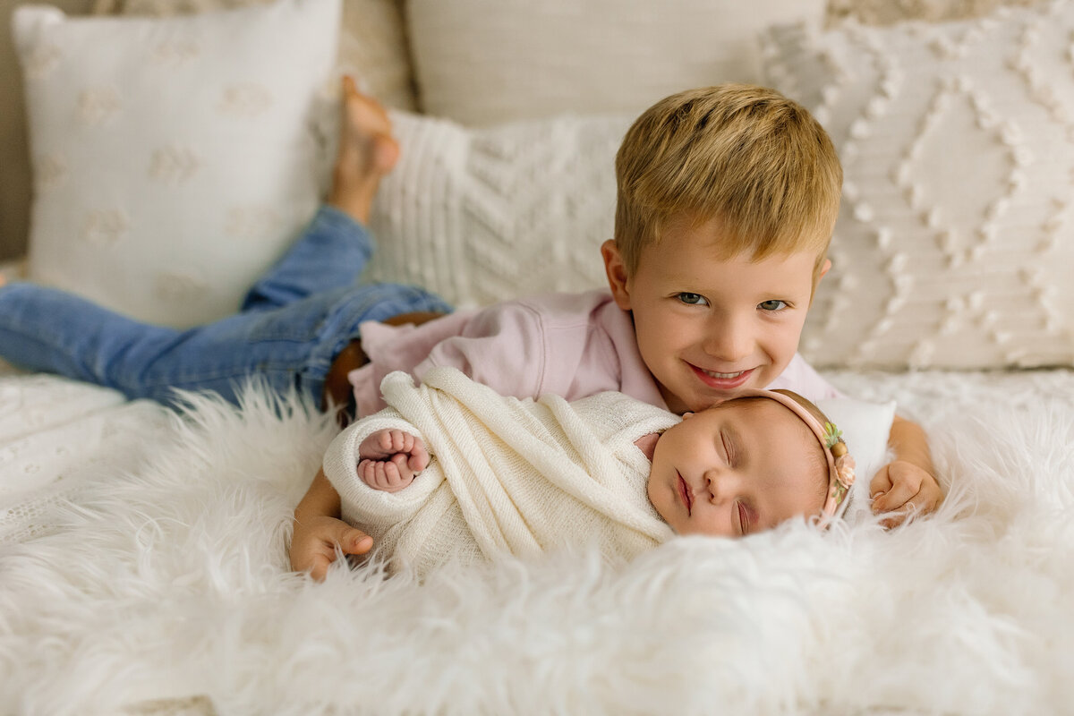 Brother with baby sister