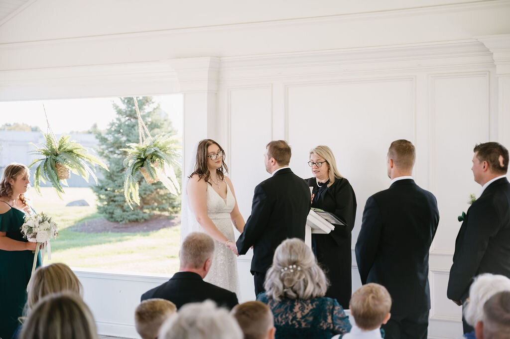 wedding ceremony in open air chapel at Zuccaros in Chesterfield Michigan