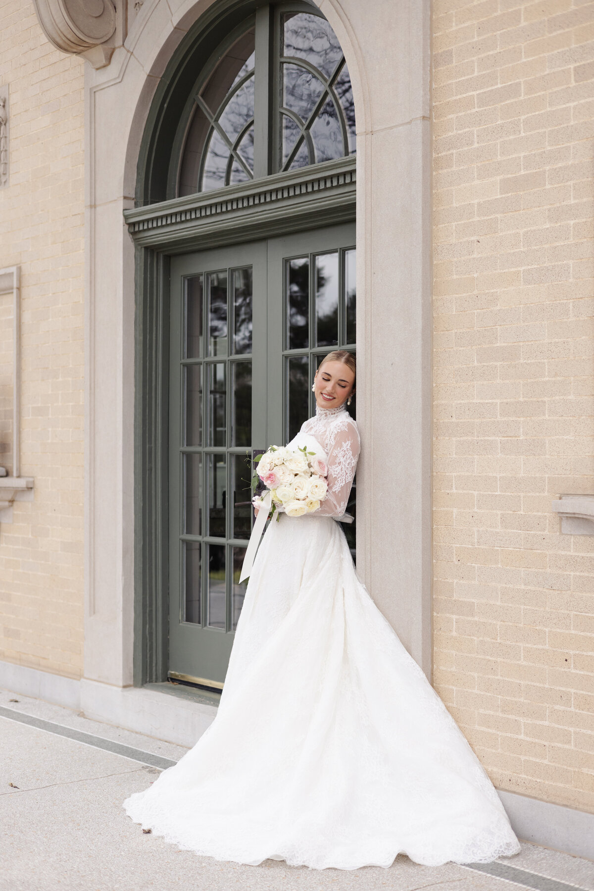 Close-Up of Bridal Buttons and Train