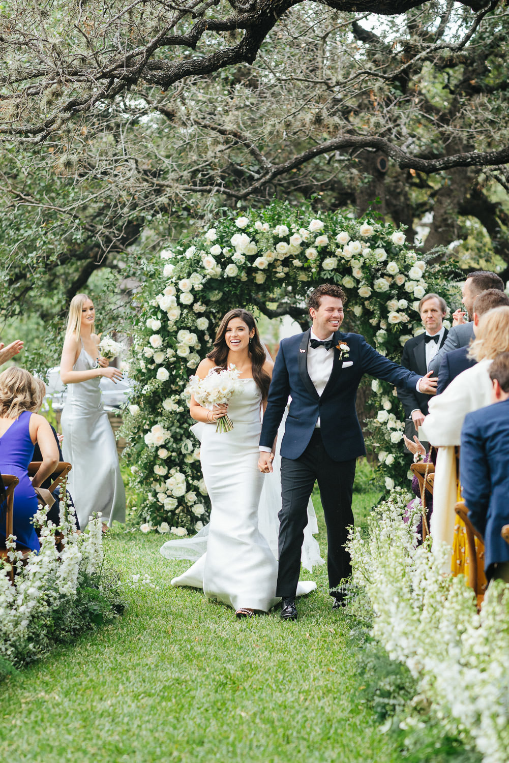 groom and bride ceremony recessional smiling Matties wedding Austin