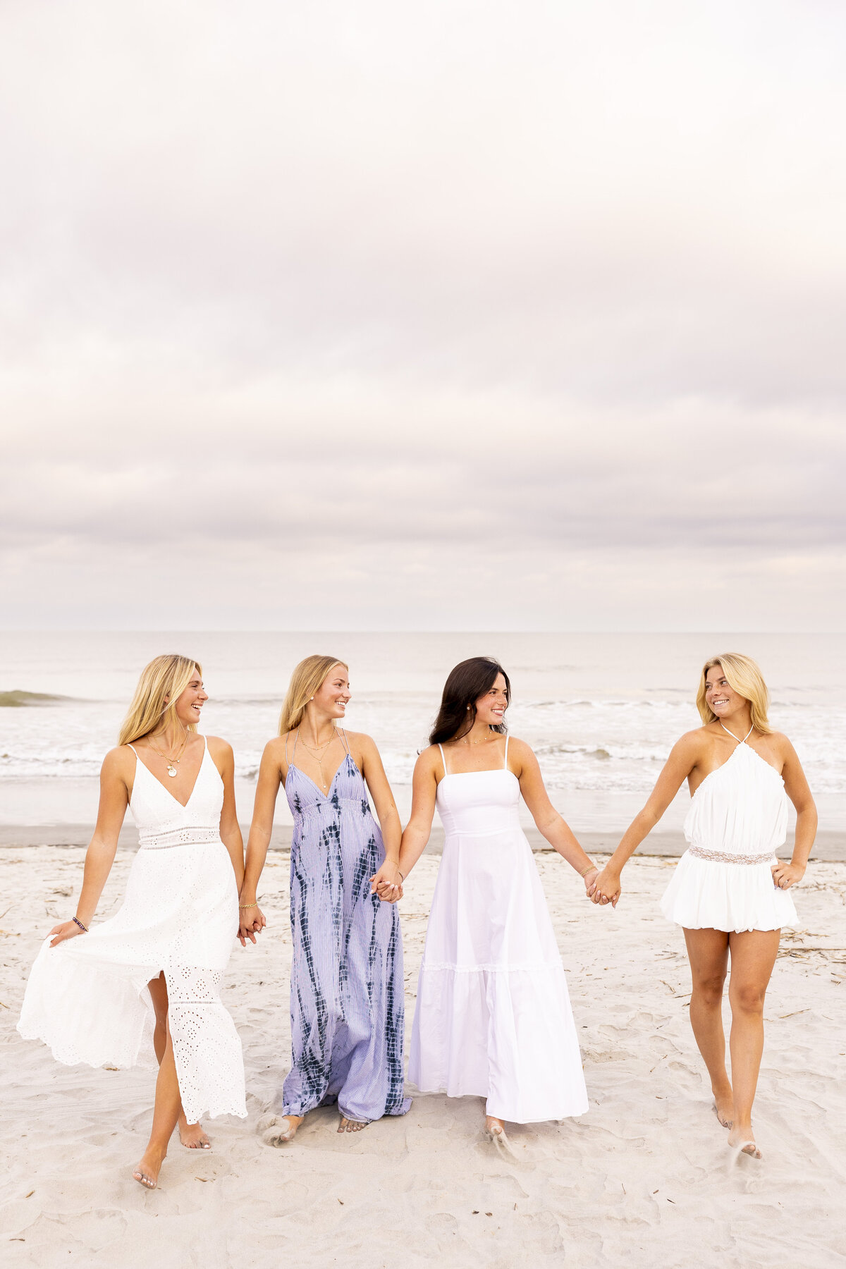 joyfulseniorsessionwithcollegeofcharlestonstudentsonfollybeachcharlestonphotographedbymarykathleenphotography