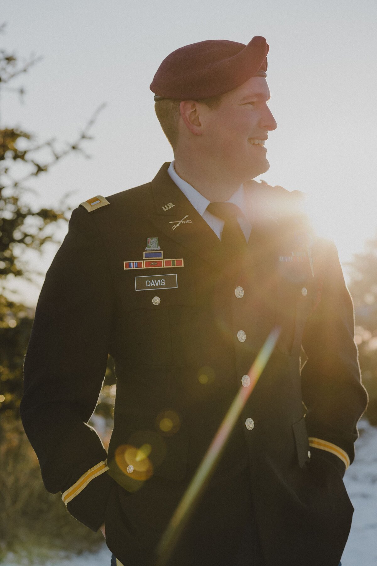 Alaska military groom poses at sunset