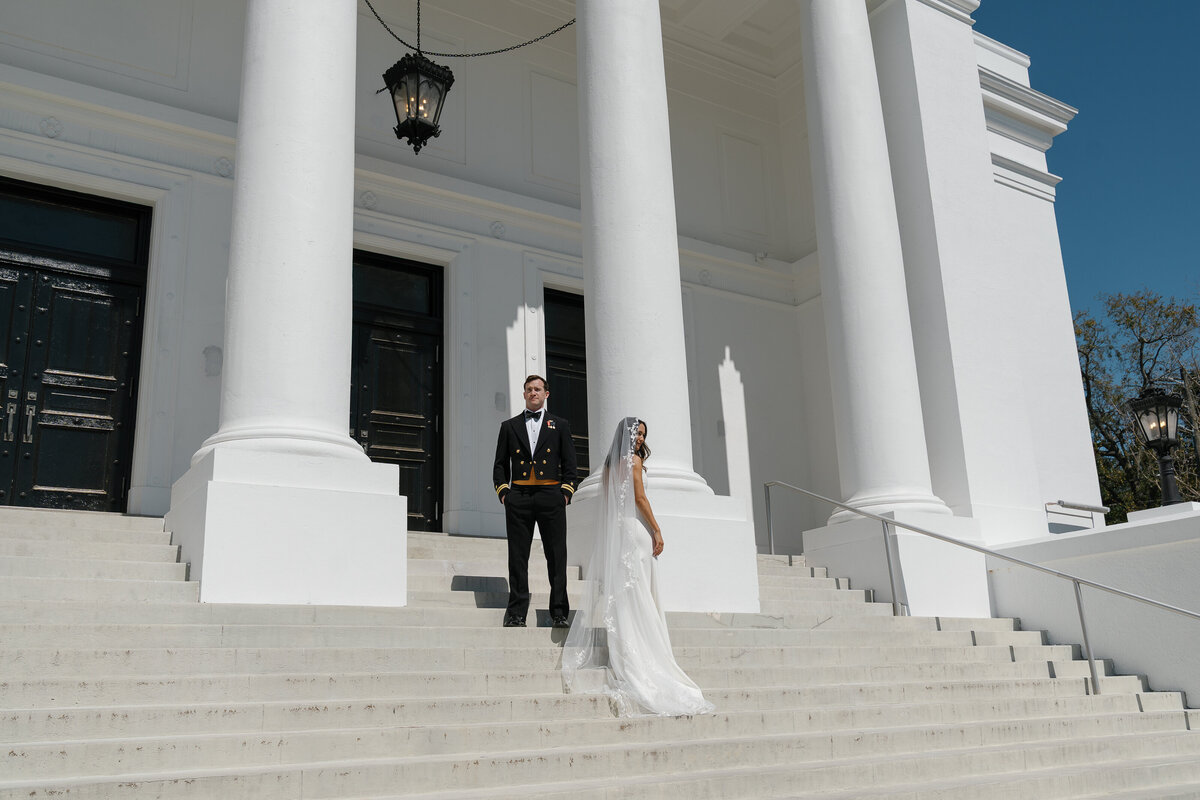 Bride and Groom posing on stairway taken by film wedding photographer Shelby Ann Photos