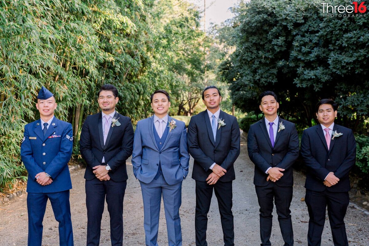 Groom and Groomsmen pose for photos