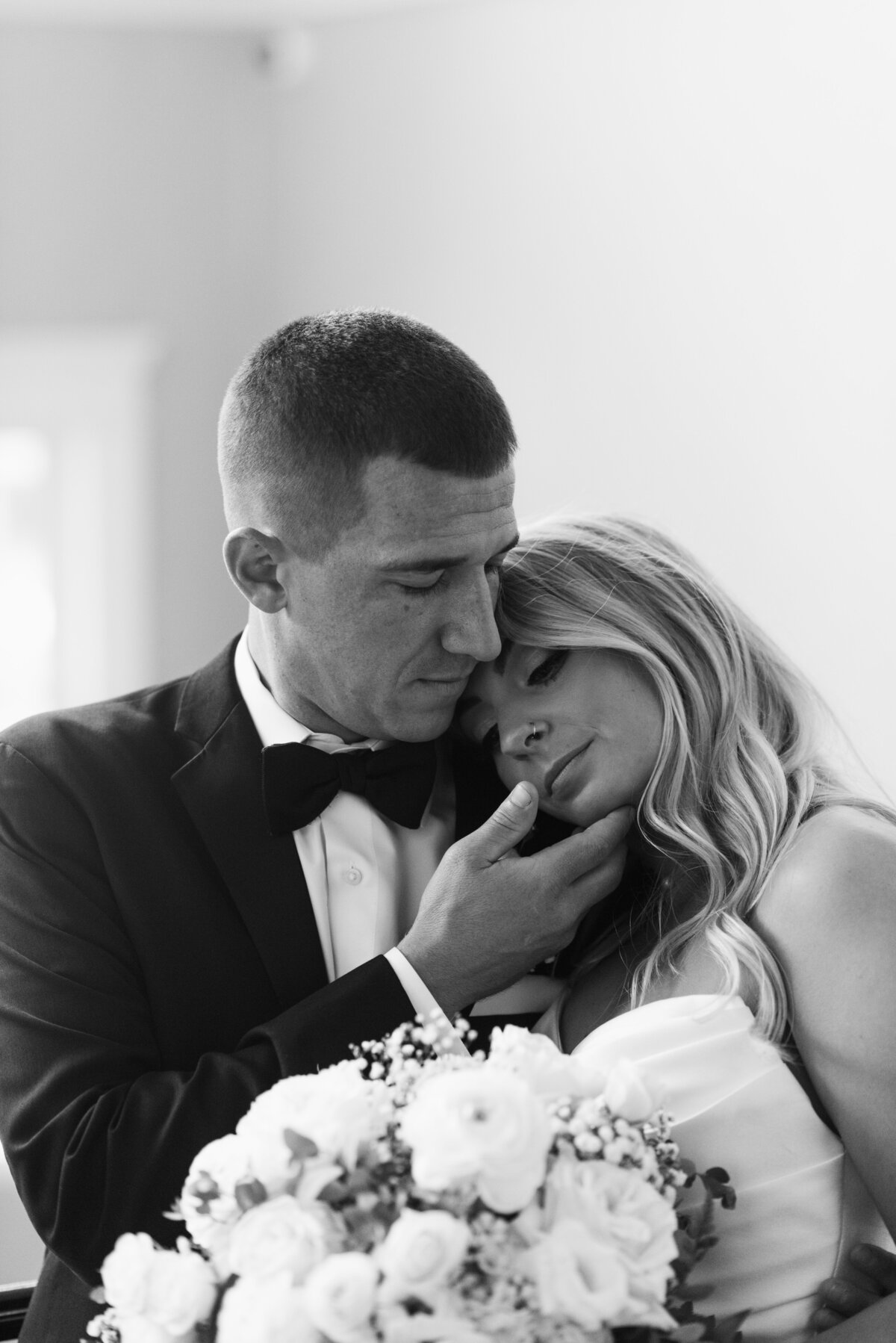 Bride and groom holding each other lovingly during their wedding day in Doylestown, Pennsylvania