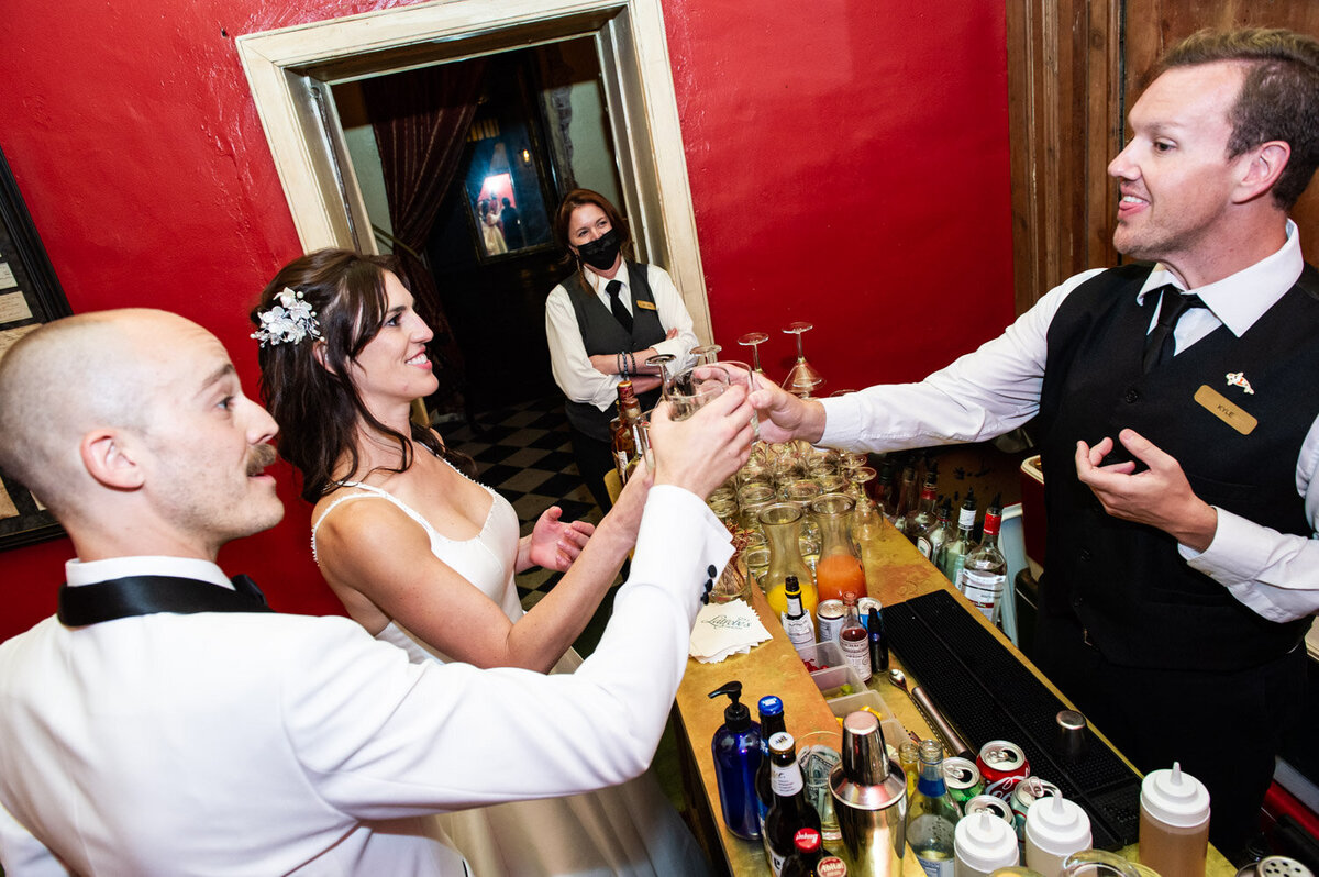 Bride and groom visit vault bar at Latrobe's