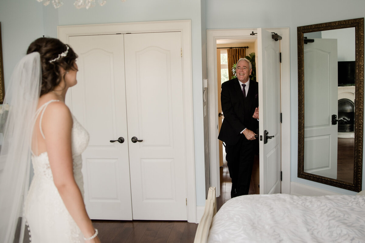 Dad seeing her daughter for the first time in wedding dress - Shot by Toronto Wedding  Photographer