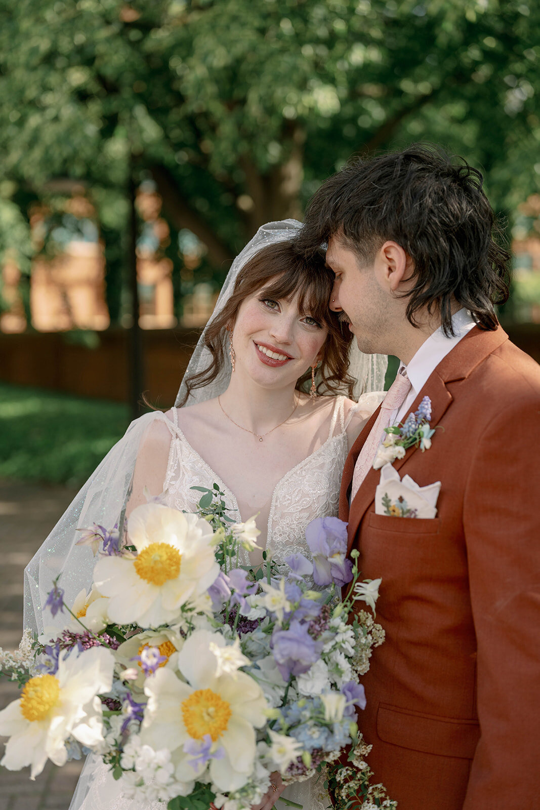 Bride and groom Portraits at Record Box Loft captured by Michigan wedding photographer