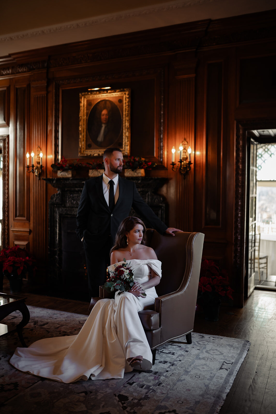 Bride and groom posed for a timeless photo of them in a wooden room.