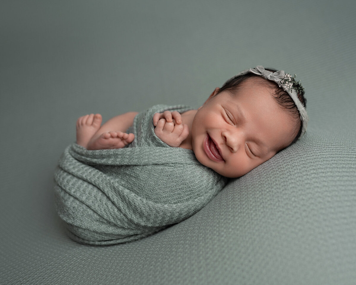 Newborn baby girl mint green wrap Georgetown professional photographer