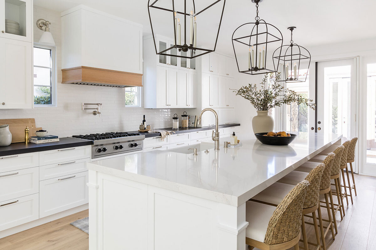 Open-concept living space with classic California Coastal design and warm tones
