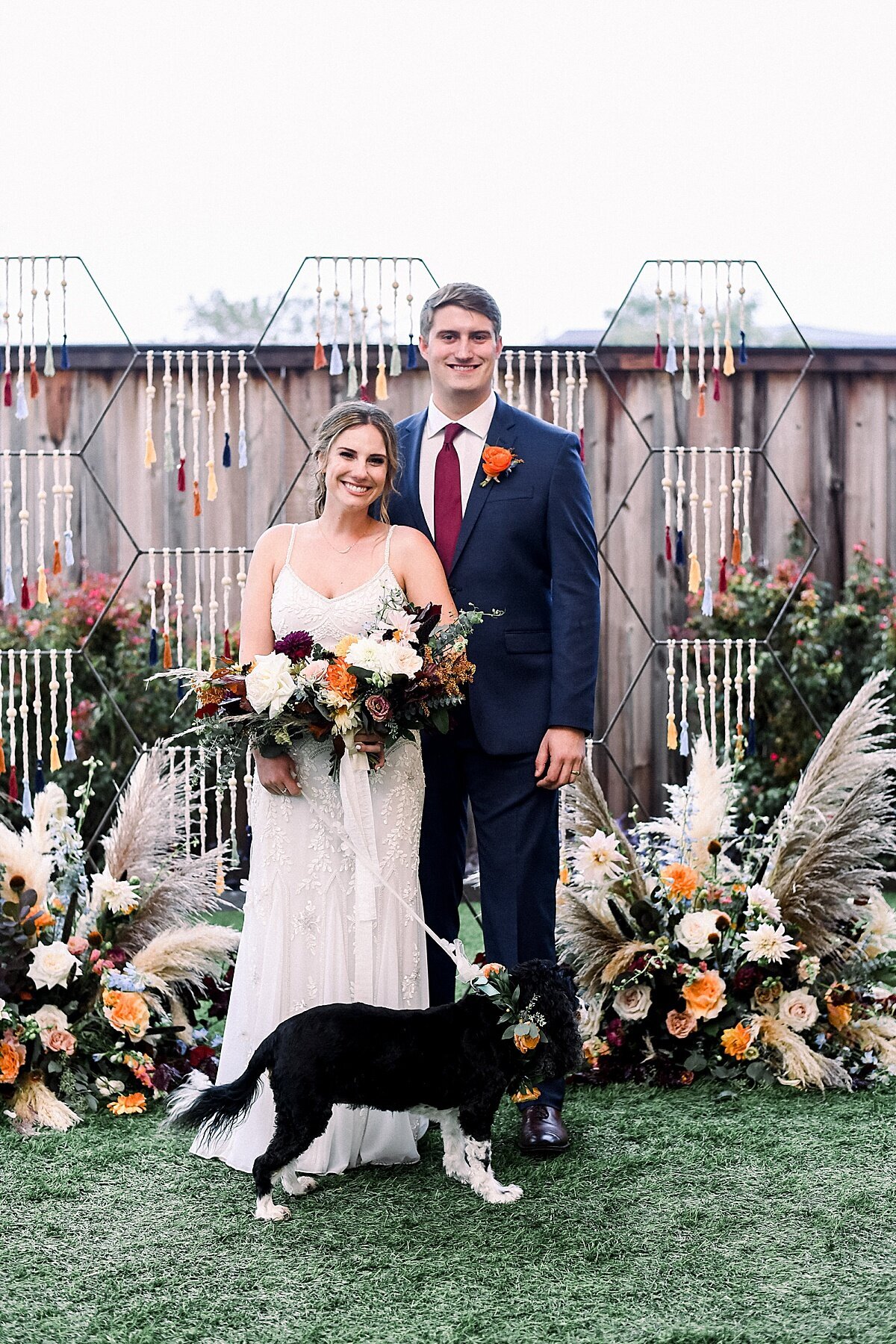 Wedding Ceremony with Unique Ceremony Backdrop with Florals by Vella Nest in Dallas Fort Worth