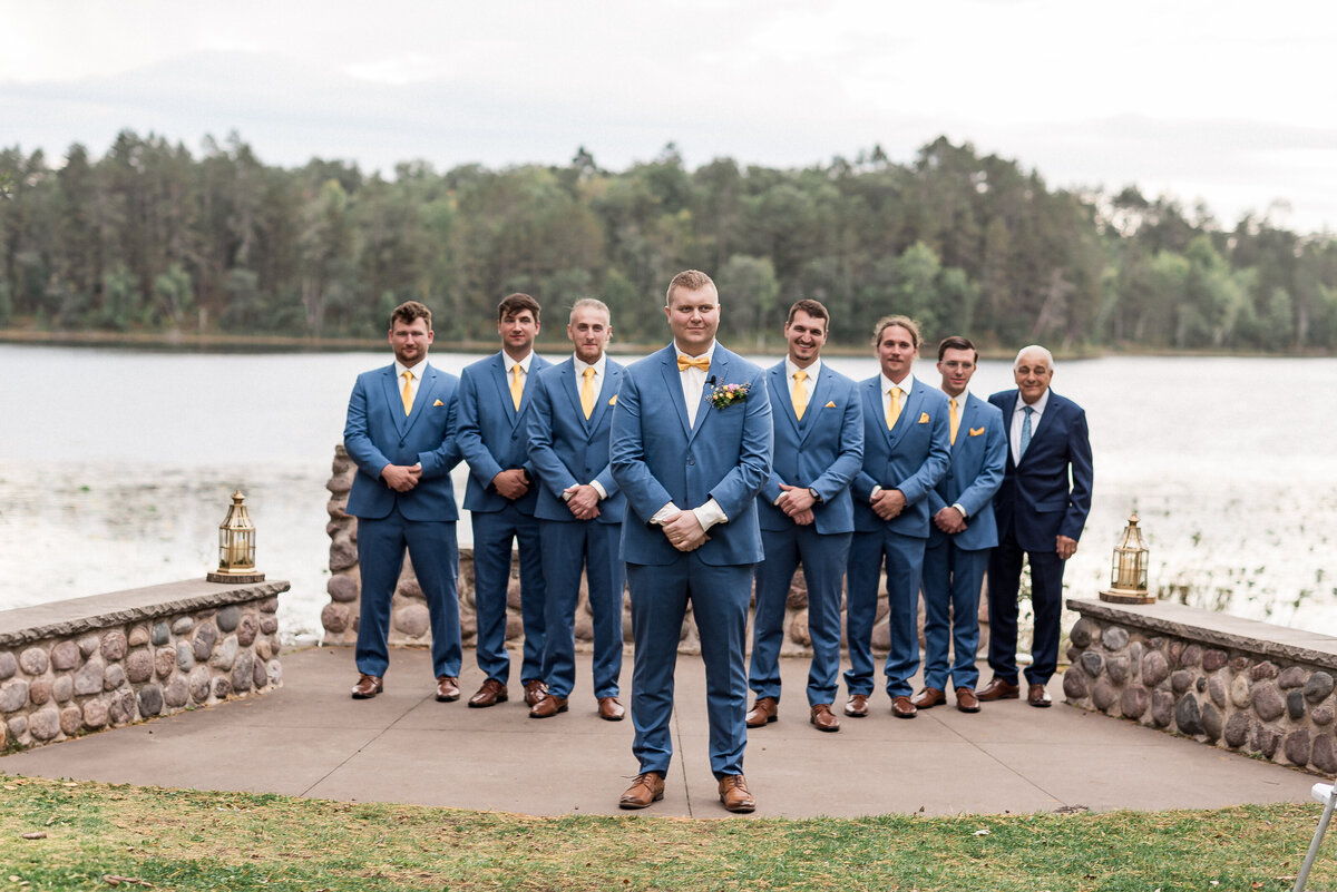 Bride and groom leaving wedding in decorated car