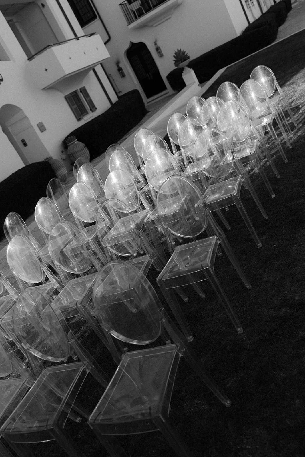 Acrylic chairs glowing in the sun of Alys Beach Ceremony