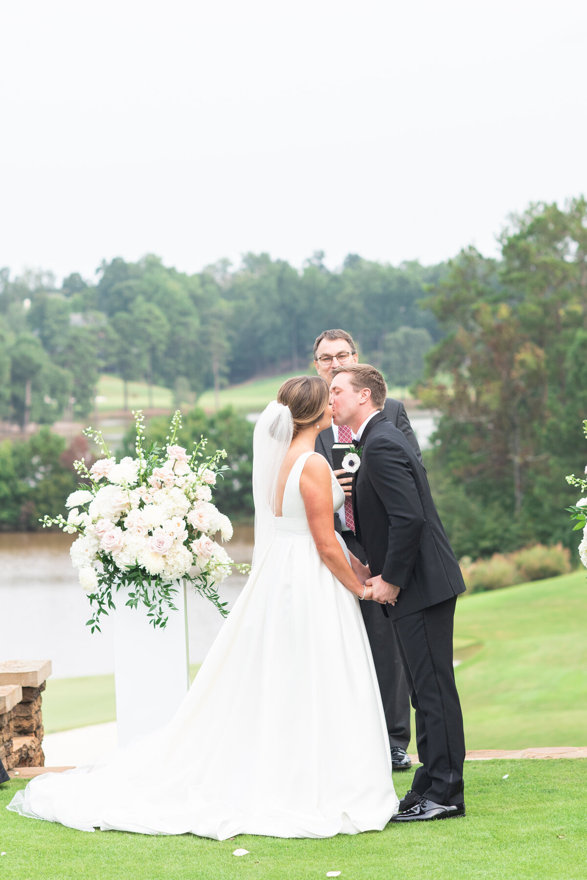 bride and groom's first kiss