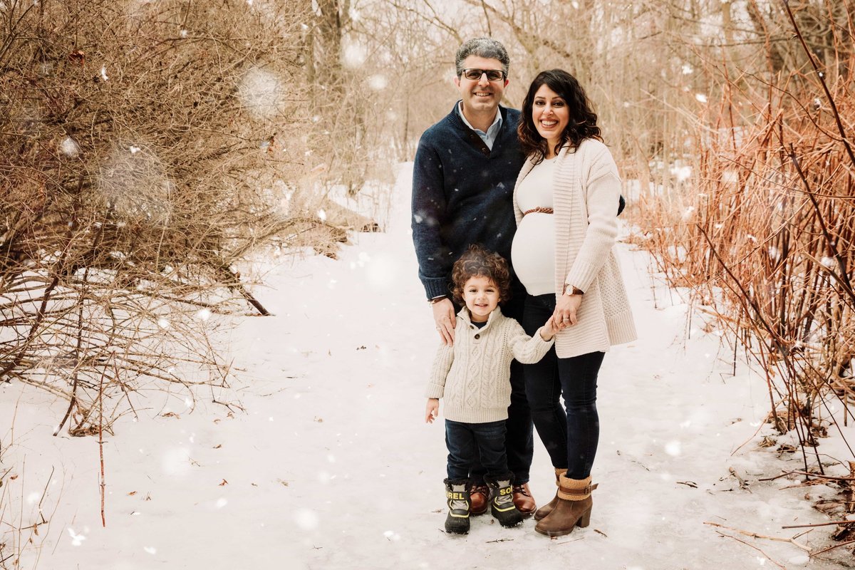 Family outdoors in the snow