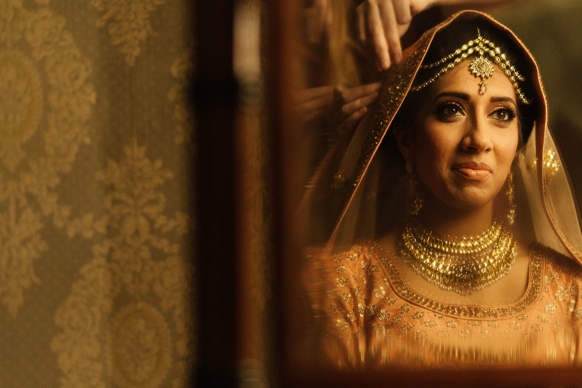 Indian bride during bridal preparations at her wedding in York
