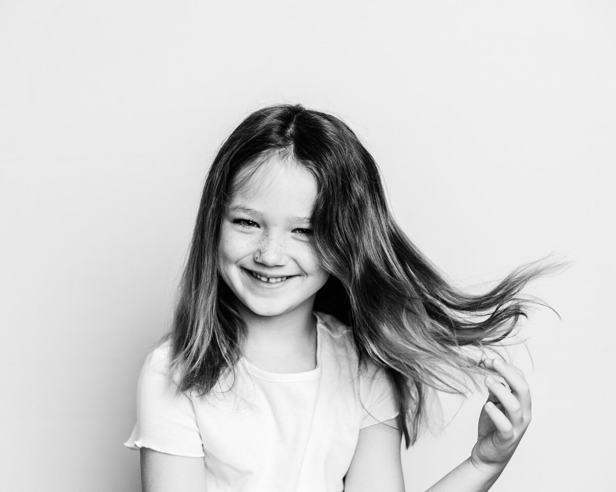 girl playing with hair long island photographer