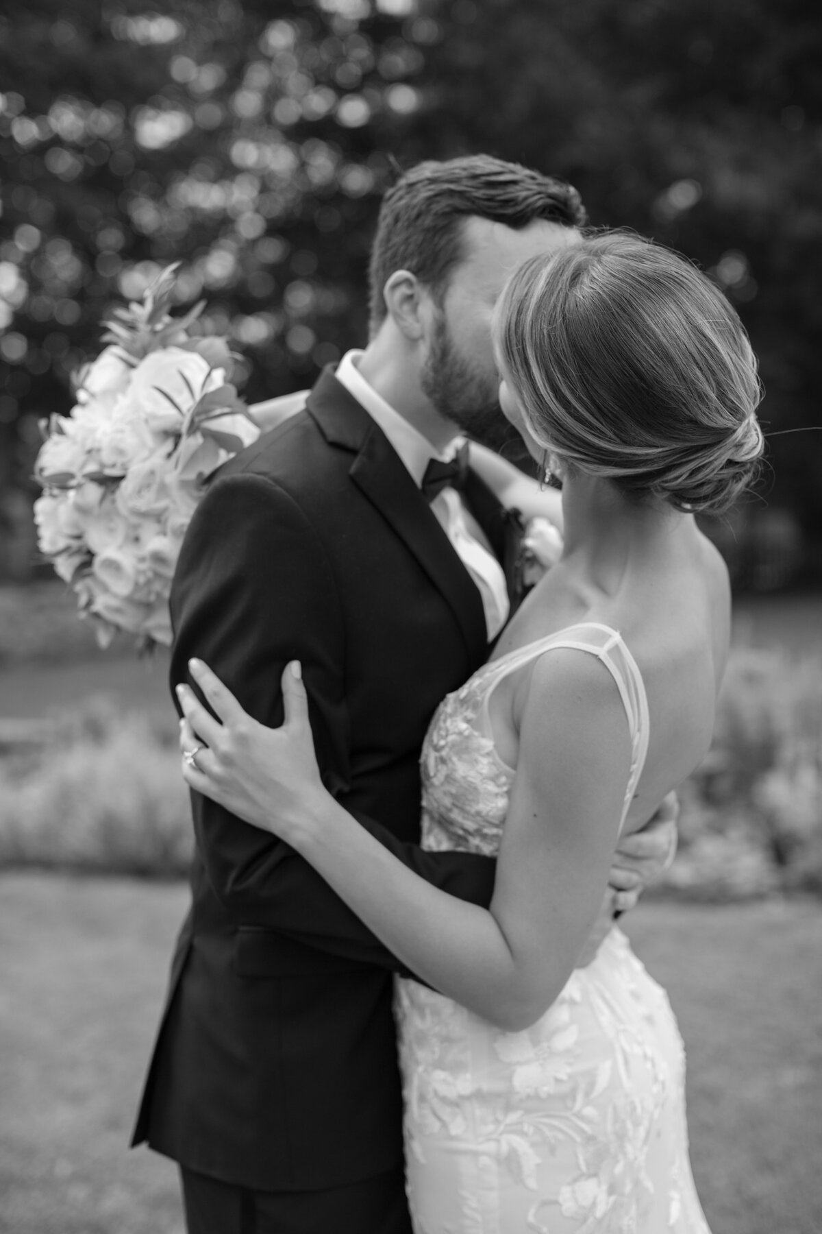 Bride and Groom kiss on wedding day in Newport.