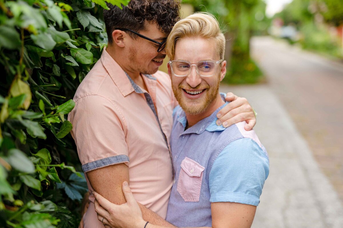 Gay couple posing for engagement photos in indianapolis