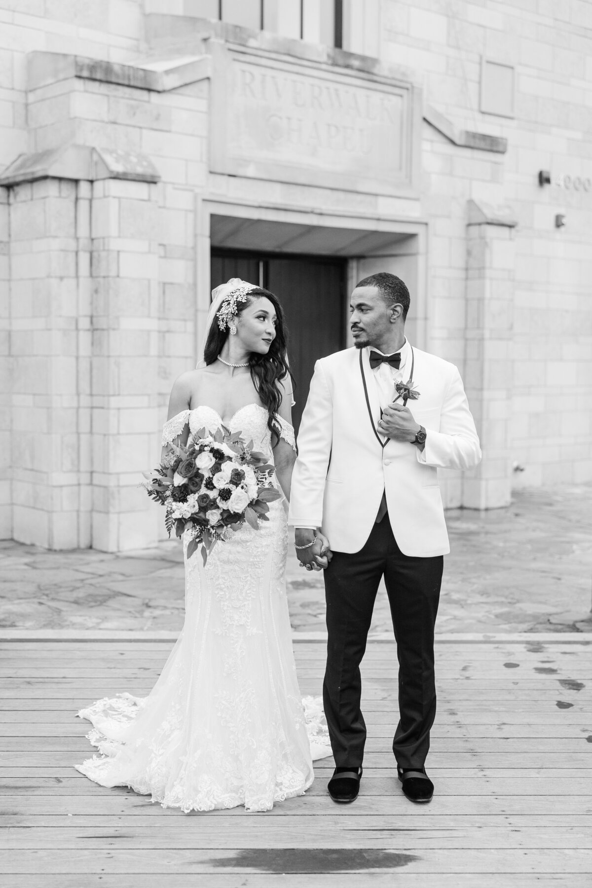 Bride-and-groom-in-front-of-their-wedding-chapel-in-flower-mound-texas