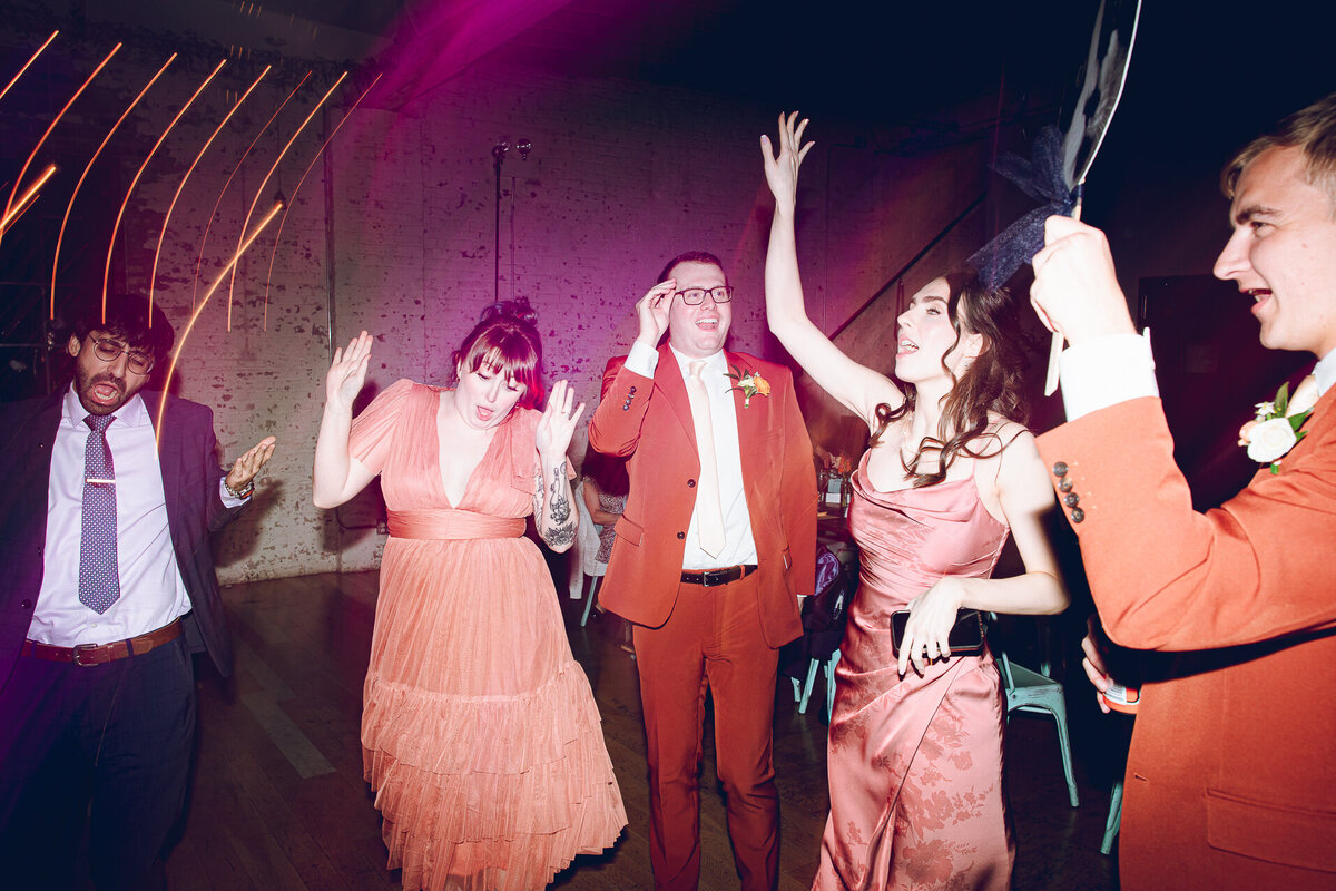 The wedding party opens the dance floor up at a wedding at The Joinery in Chicago