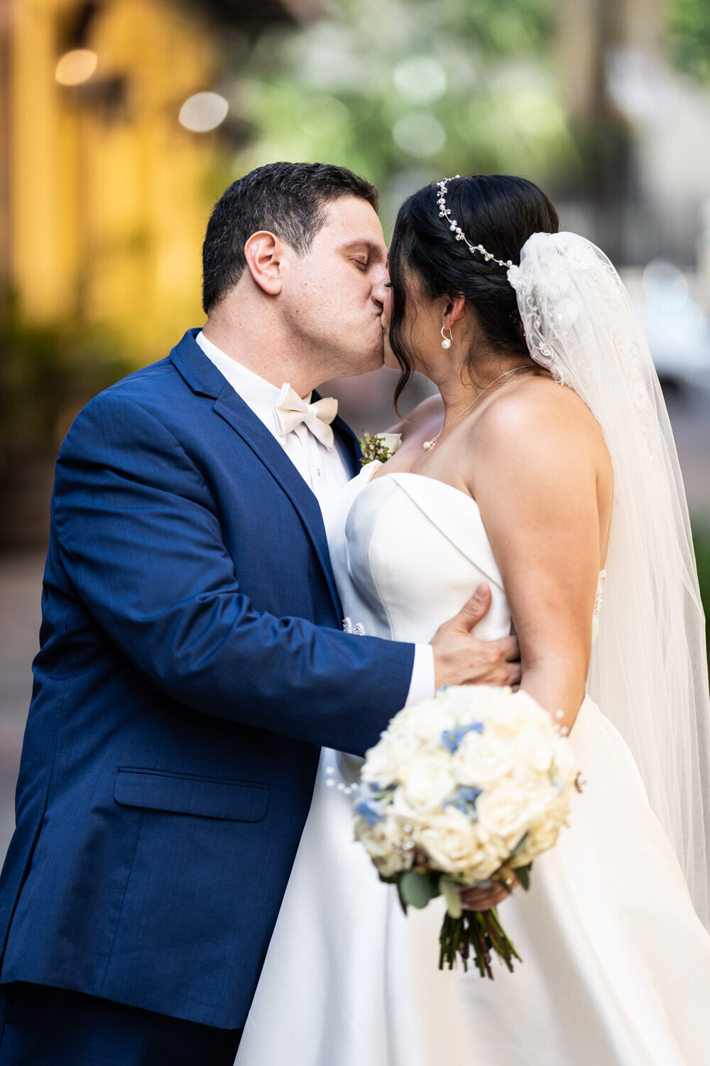 Couple kissing in Exchange Place
