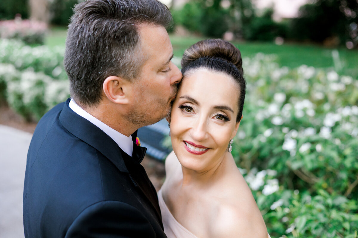bride and groom winter park rose garden