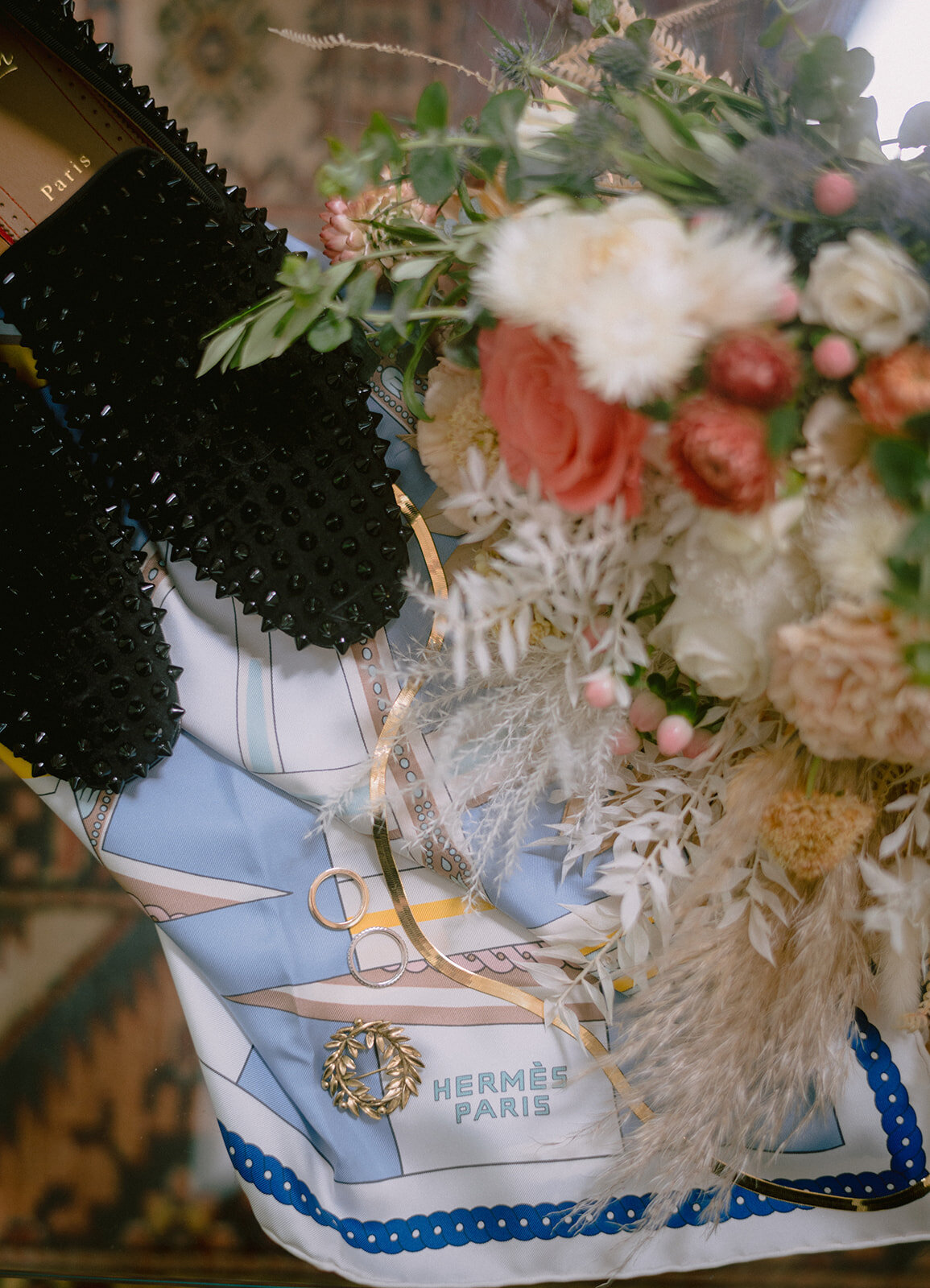 bride shoes and bouquet laid over hermes scarf photo by cait fletcher photography