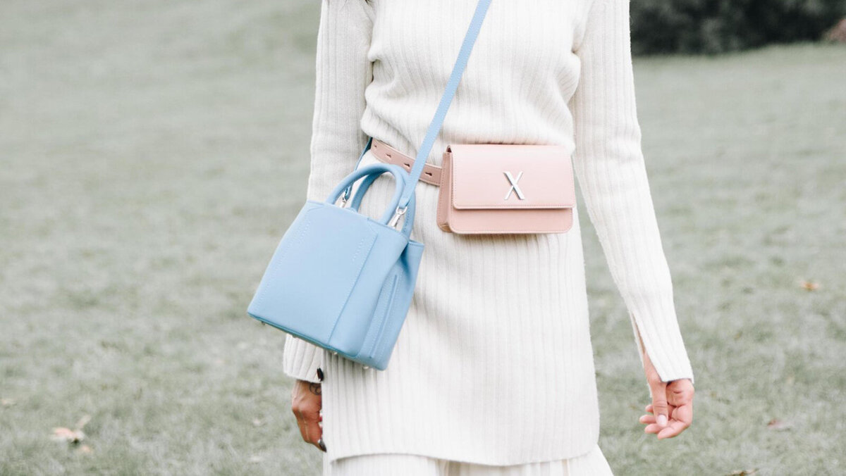 A stylish pastel handbag from LUXTRA, a vegan and sustainable fashion brand.