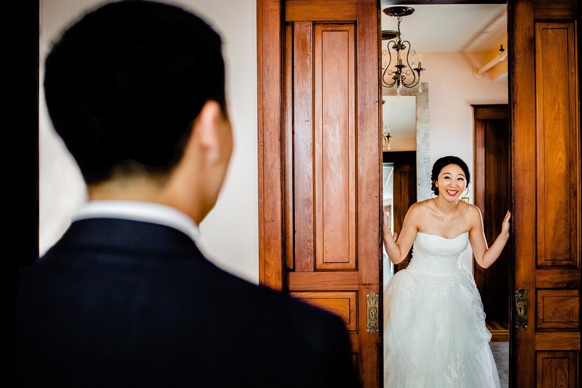 A bride and groom share a first look at a wedding at The Haight in Elgin.