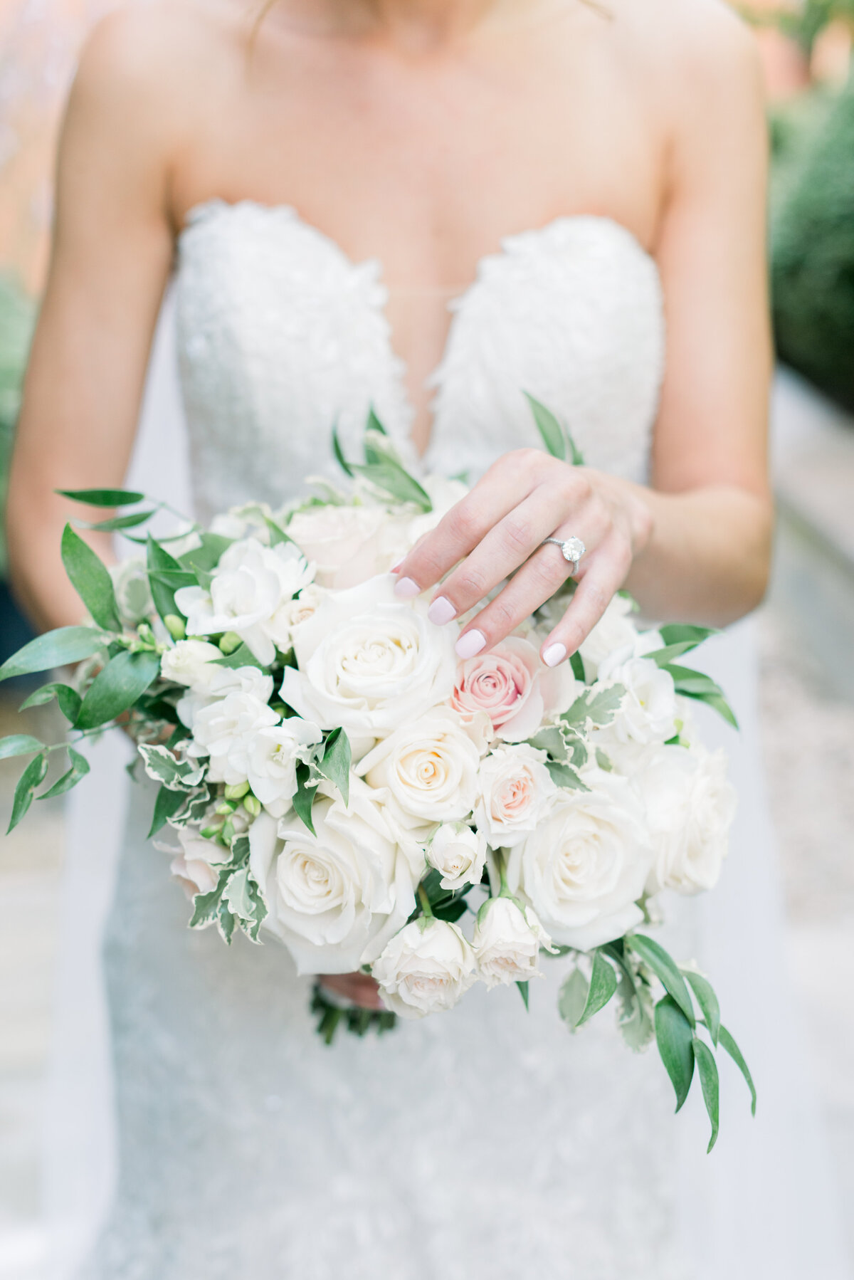 Classic and elegant wedding floral bouquet with bride's engagement ring at Glenmere Mansion in new York.