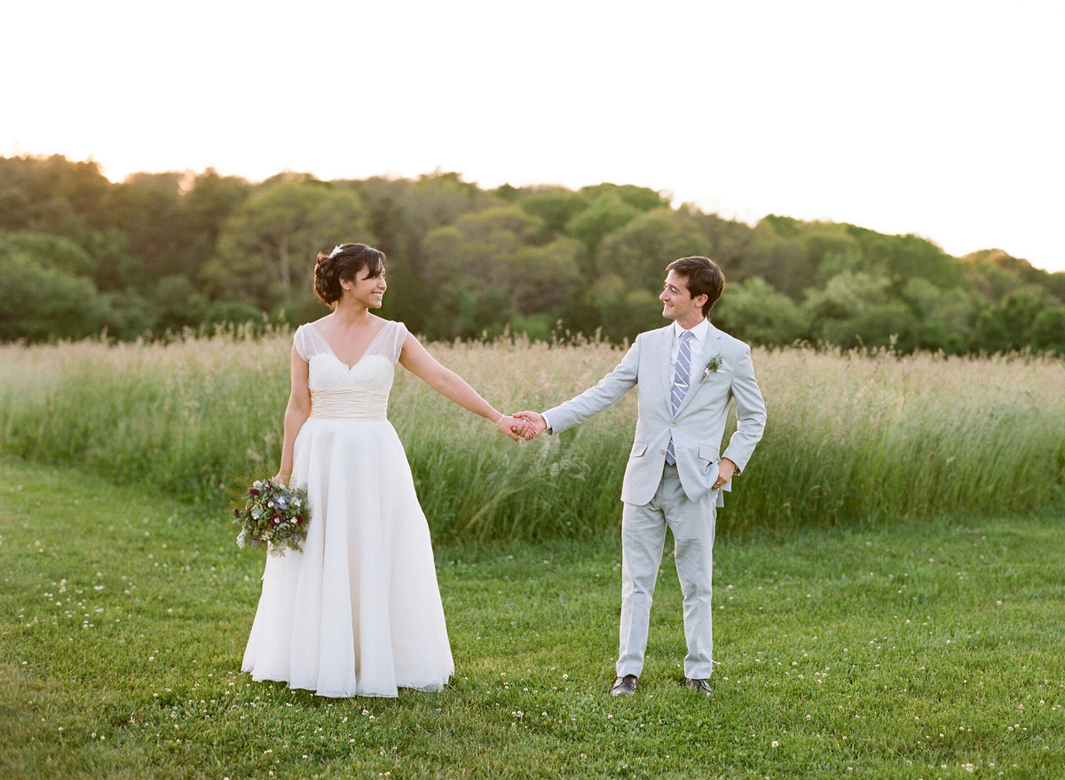 Bride and groom in field Bourne Farm wedding