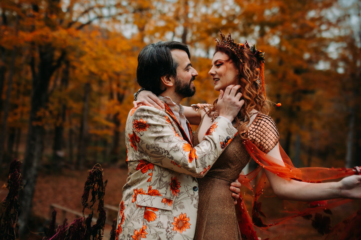 a photo of a bride and groom sharing a sweet moment at sunset in new york on their wedding day