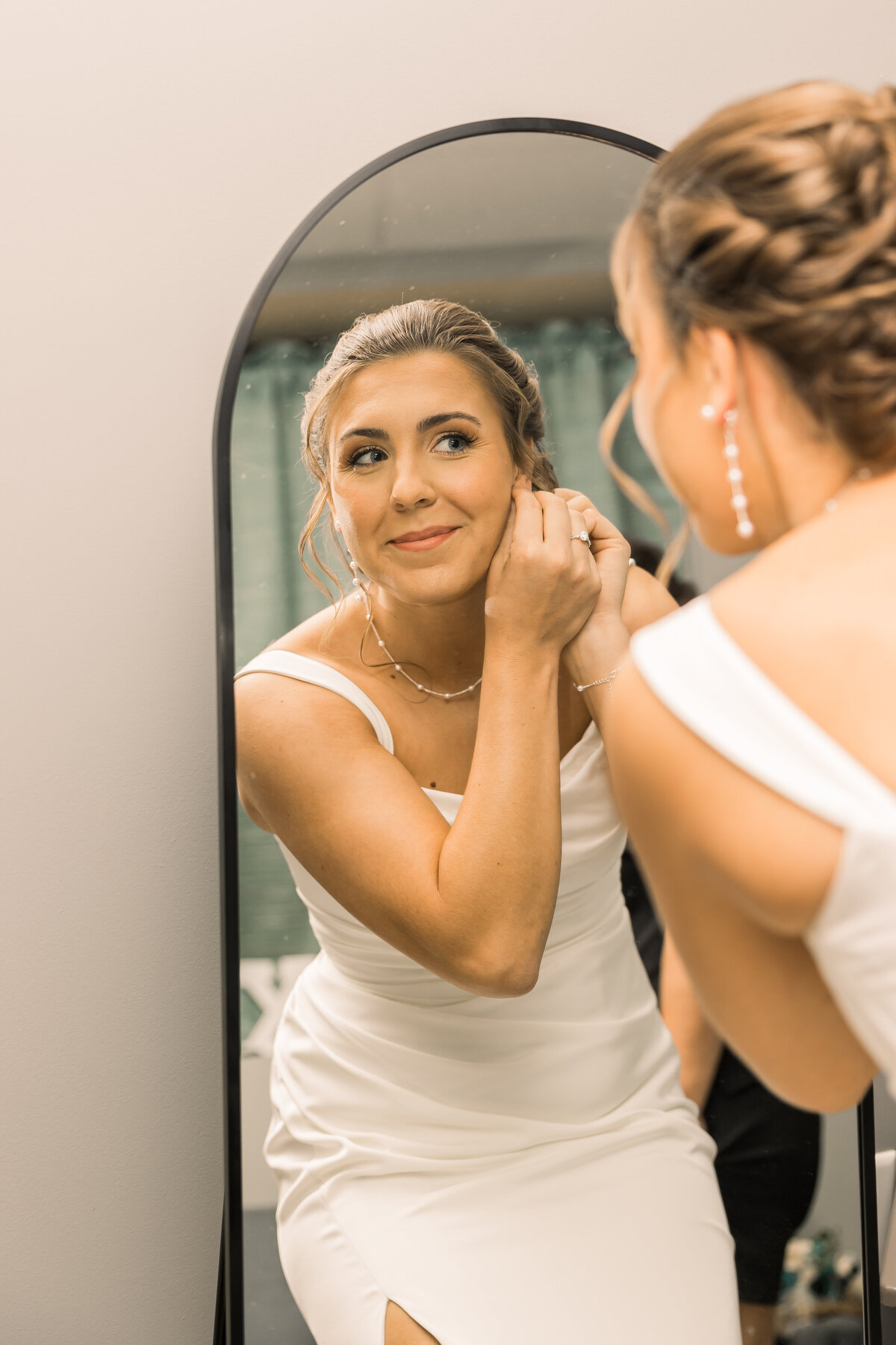 Bride getting ready on her wedding day in Central MN