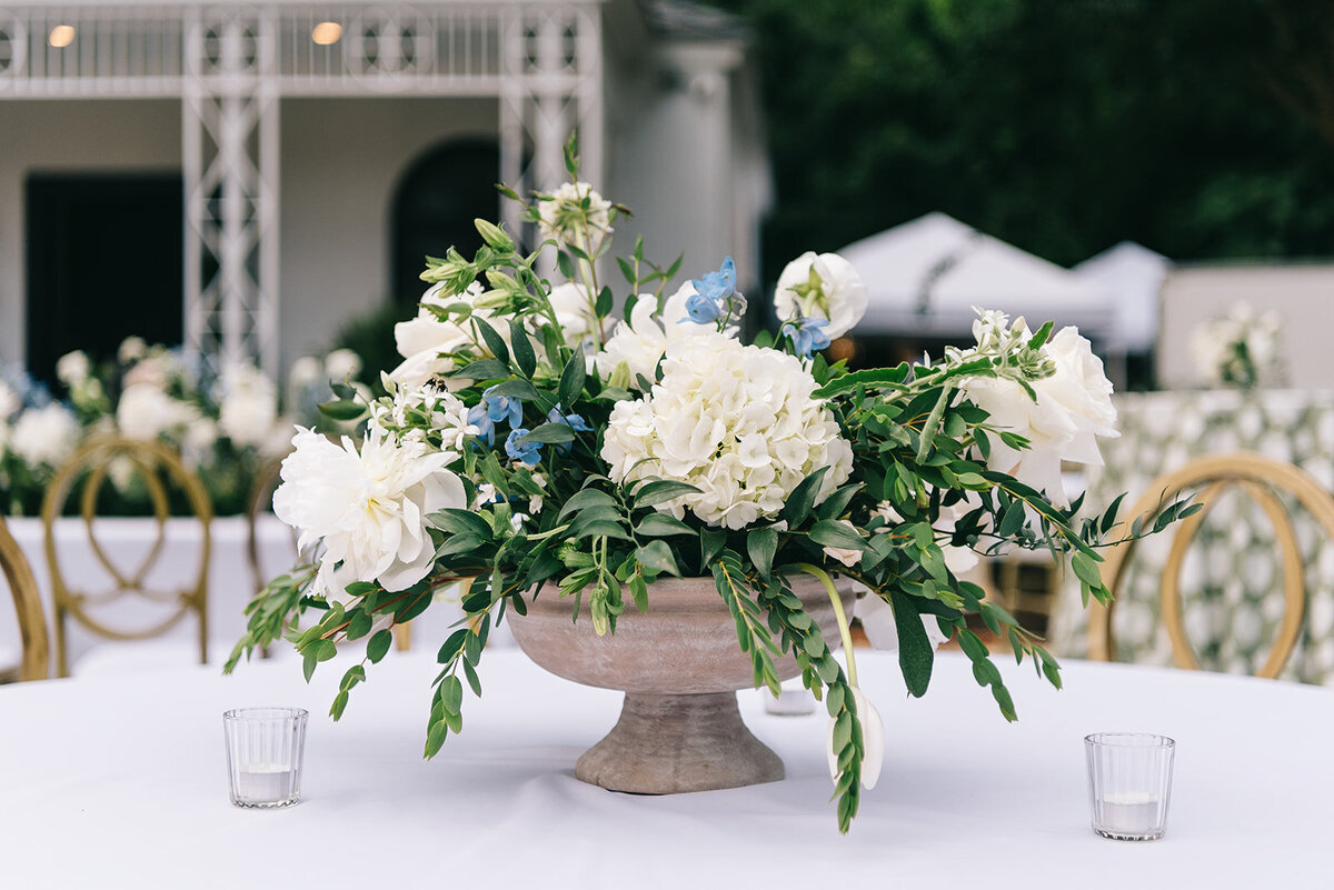 White and blue floral centerpieces designed by Abby Grace Florals at Greenville SC wedding